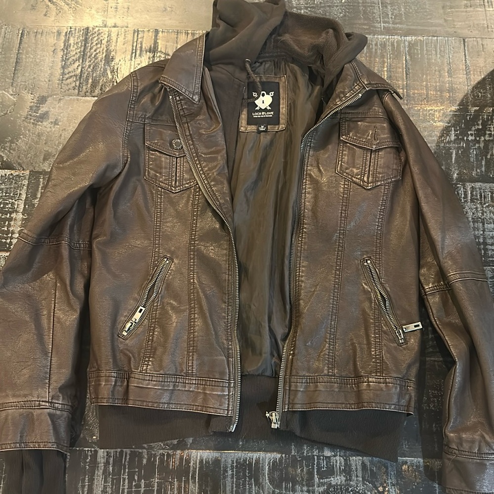 Not real Leather but a PLEATHER MATERIAL jacket 
Medium Brown